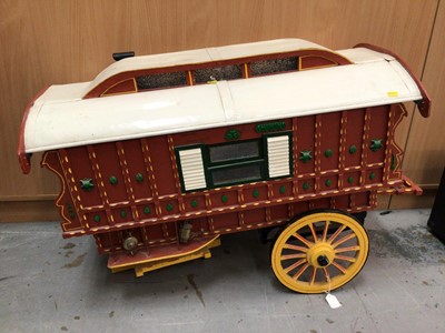 Lot 1824 - Doll's red painted caravan with yellow cart wheels, white roof and green decoration