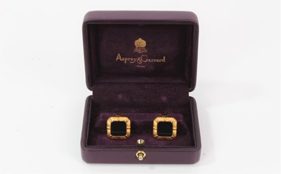 Lot 337 - Pair of Asprey & Garrard 18ct gold and hematite square panel cufflinks