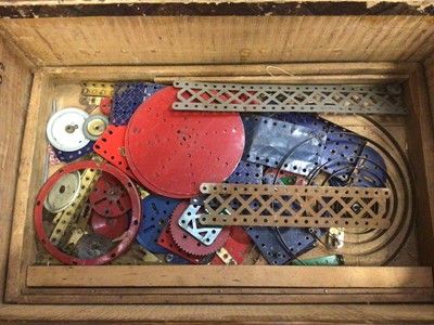 Lot 543 - Selection of vintage Meccano in scratch made box with three internal compartment layers