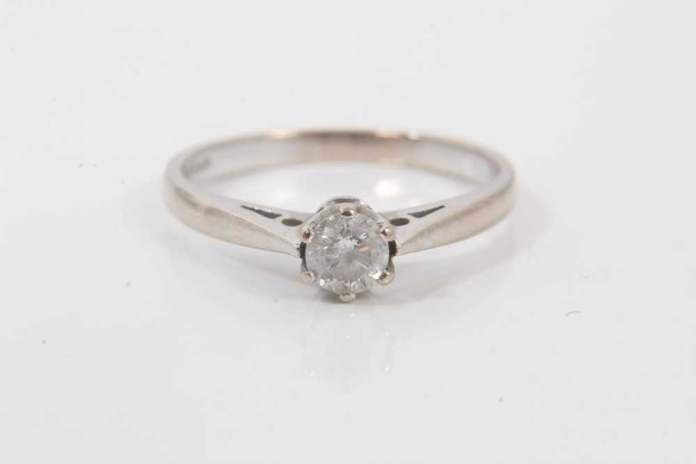 Lot 118 - Diamond single stone ring with a round brilliant cut diamond, weighing approximately 0.25cts, in six claw setting on 18ct white gold shank