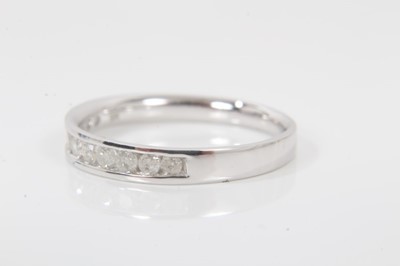 Lot 120 - Diamond eternity ring with eleven round brilliant cut diamonds, weighing 0.33cts in total, in 9ct white gold channel setting