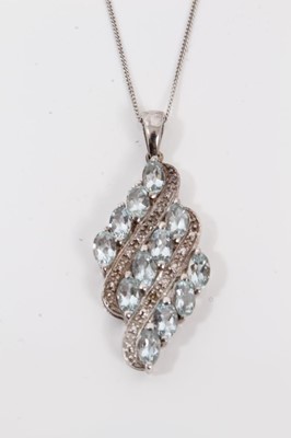 Lot 121 - Aquamarine and white topaz ring in platinum overlaid silver setting together with an aquamarine cluster pendant in platinum overlaid silver setting on silver chain