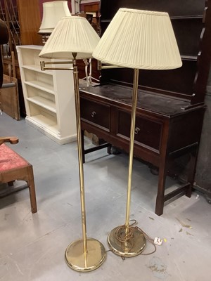 Lot 904 - Two brass standard lamps with shades