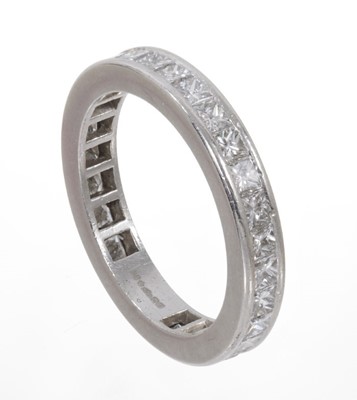 Lot 554 - Princess cut diamond eternity ring