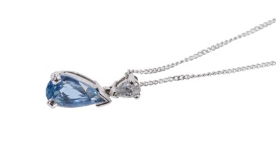 Lot 555 - Aquamarine and diamond pendant on chain