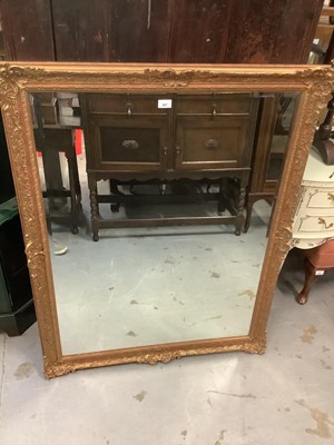 Lot 927 - Large bevelled wall mirror in gilt effect frame, 94cm x 121cm