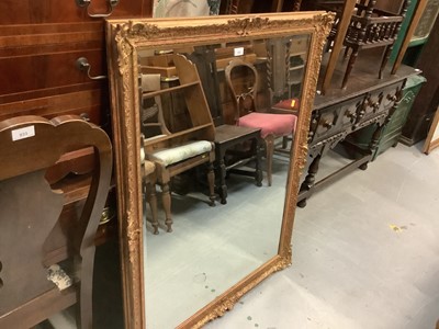 Lot 932 - Large bevelled wall mirror in gilt effect frame, 94cm x 121cm