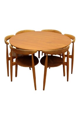 Lot 1312 - Hans Wegner circular dining table and set of six stacking heart chairs