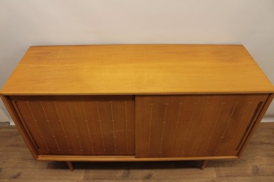 Lot 1313 - 1950s Heals satin birch sideboard