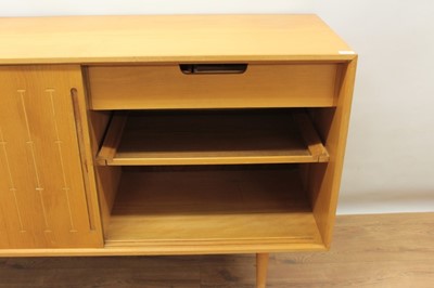 Lot 1313 - 1950s Heals satin birch sideboard