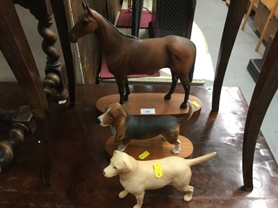 Lot 338 - Beswick model of a Basset Hound, together with a Beswick Horse and another Beswick Dog (3)