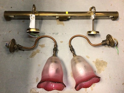 Lot 457 - Group of brass picture lights and a pair of light fittings with cranberry glass shades