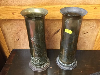 Lot 341 - Pair of First World War Trench Art shell case vases decorated with Dragons, together with a table lighter, vintage biscuit tins, pictures and sundries