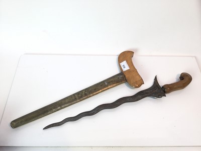 Lot 938 - 19th century Indonesian kris with carved wooden handle