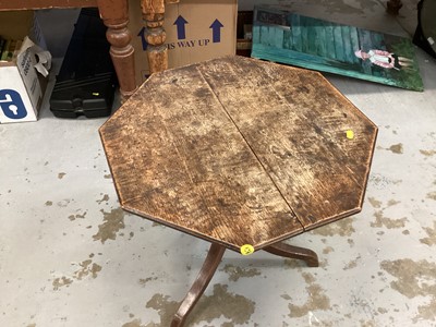 Lot 950 - Nineteenth century oak wine table with octagonal tilt top on turned column and three splayed legs, 59cm wide, 60cm high