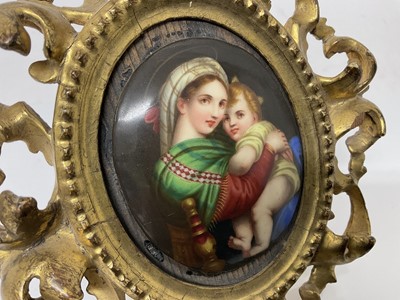 Lot 91 - 19th century Italian porcelain plaque depicting the Madonna & Child in giltwood frame