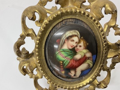 Lot 61 - 19th century Italian porcelain plaque depicting the Madonna & Child in giltwood frame