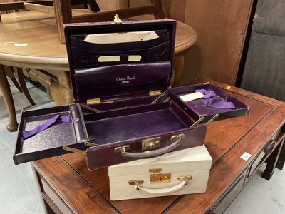 Lot 92 - Early 20th century purple leather writing case with fitted interior, together with a leather jewel case (2)