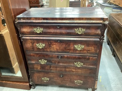 Lot 956 - Nineteenth century continental mahogany chest of four long drawers with ornate brass handles, 101cm wide, 54cm deep, 112cm high