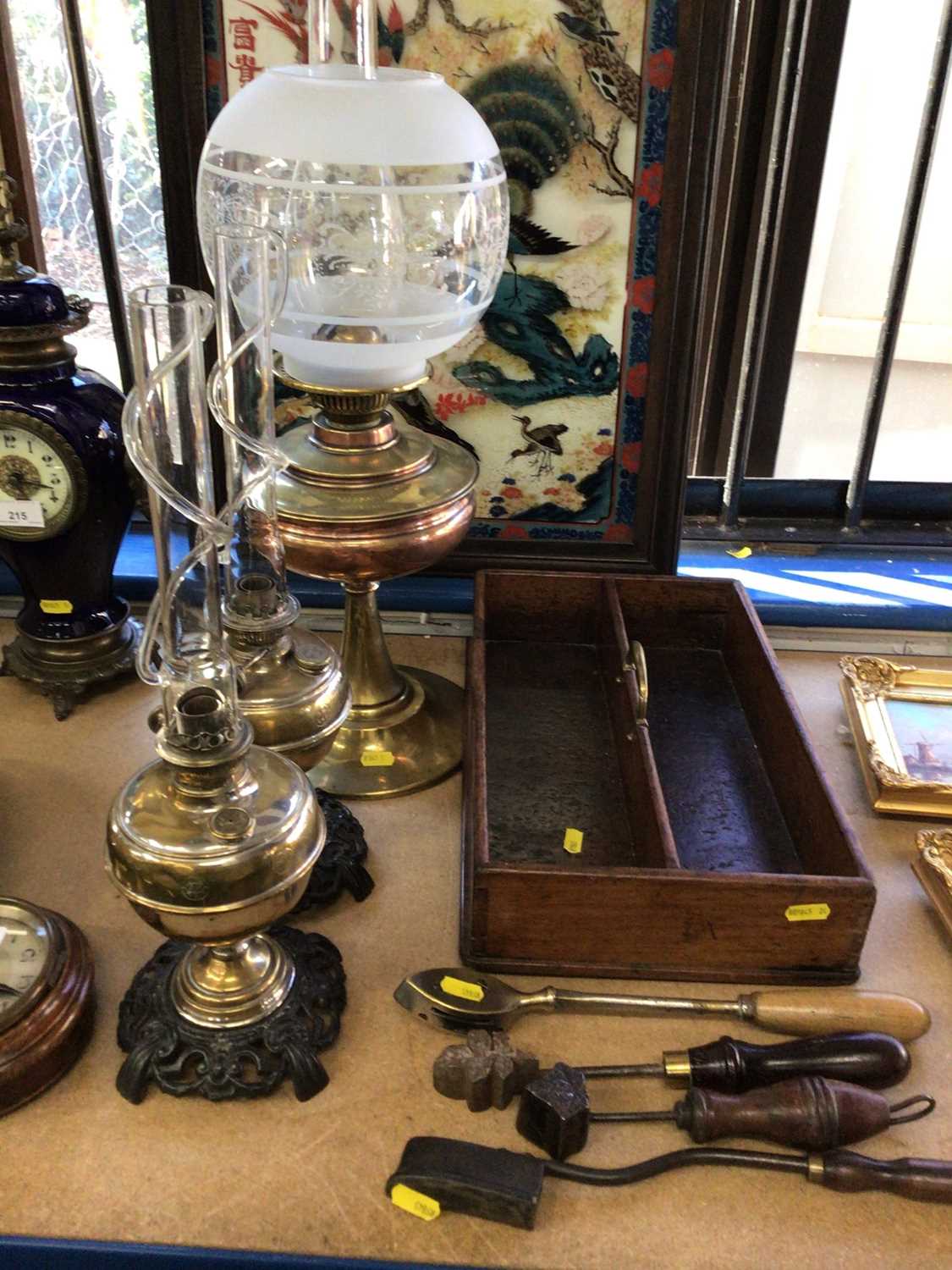 Lot 216 - George III mahogany cutlery tray, pair of Russian brass oil lamps, the chimneys with twist pattern on the outside, together with a larger copper and brass oil lamp