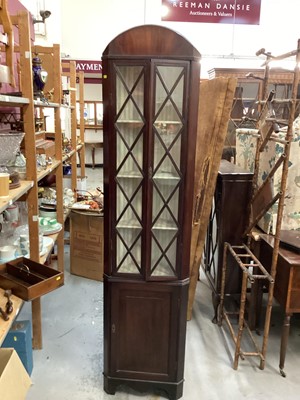 Lot 960 - Late 19th century narrow mahogany corner cupboard with shelves above enclosed by two astragal glazed doors and panelled door below, 46cm wide, 196cm high