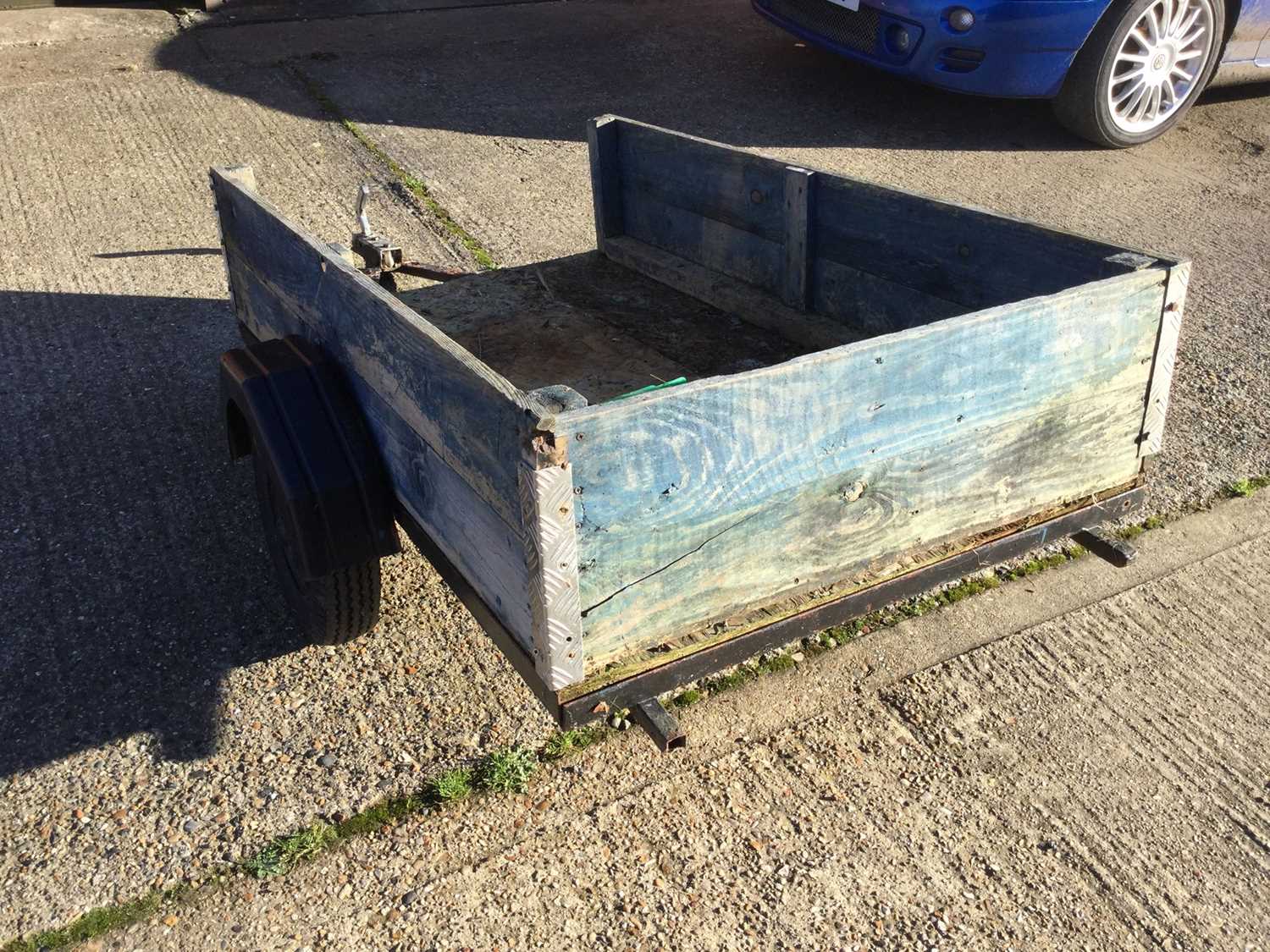 Lot 3 - By Direction of Executors: Small single axle trailer with metal frame and wood sides