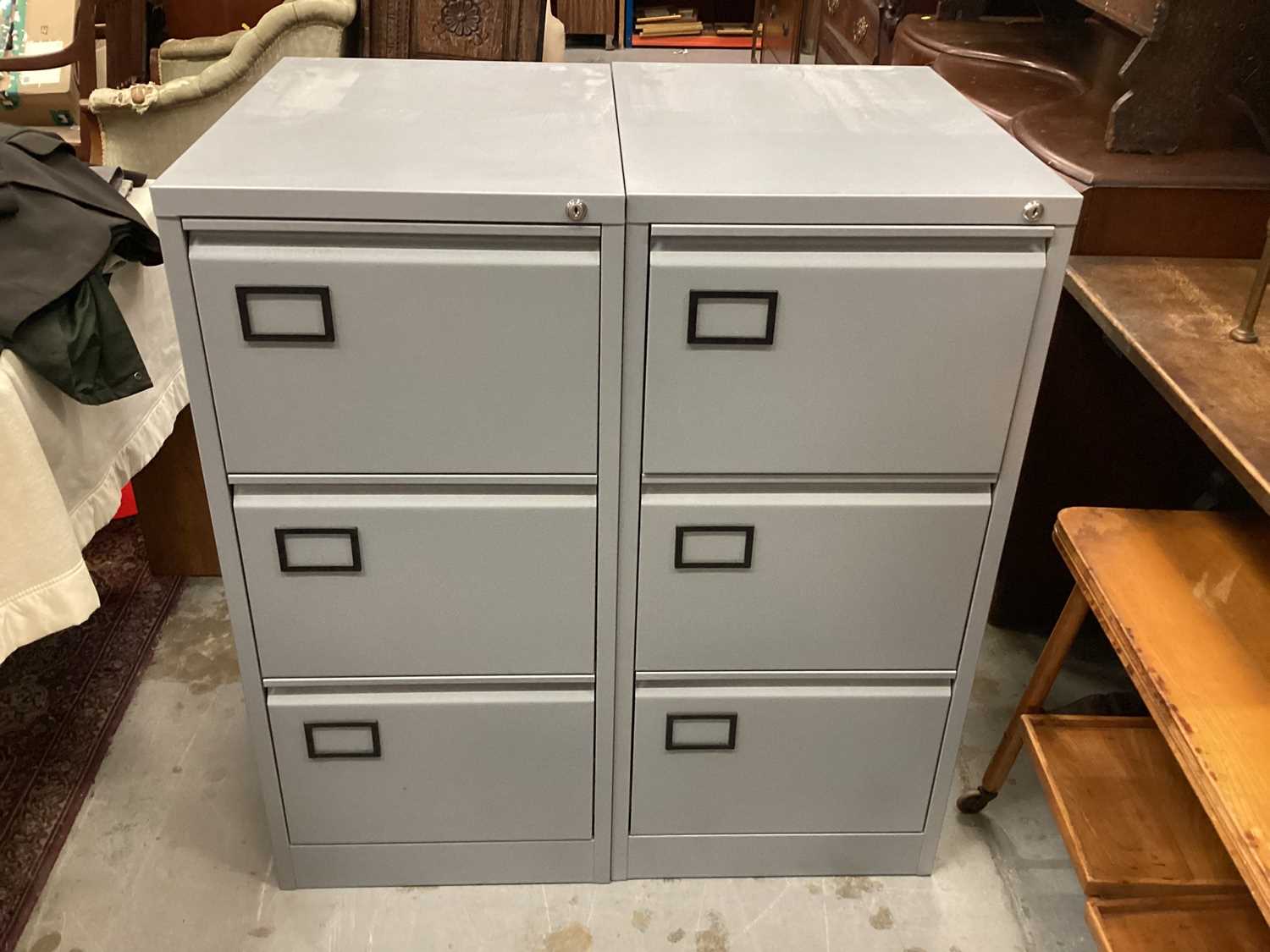 Lot 968 Two office three drawer filing