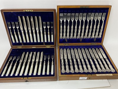 Lot 115 - Two sets of Edwardian twelve place setting silver plated fruit cutlery in original fitted cases