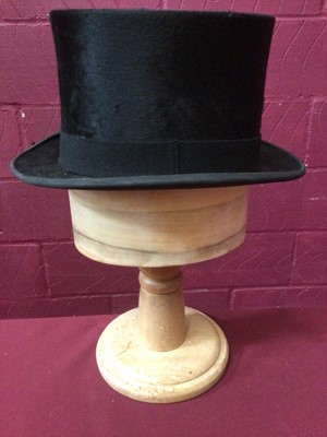 Lot 2158 - Silk top hat by G A Dunn & Co Ltd Strand London.