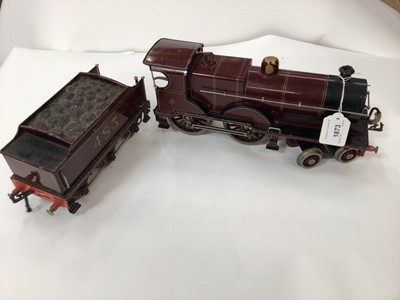 Lot 1873 - Railway Guage 1 tinplate clockwork 4-4-0 locomotive and tender No. 483, maroon and black livery