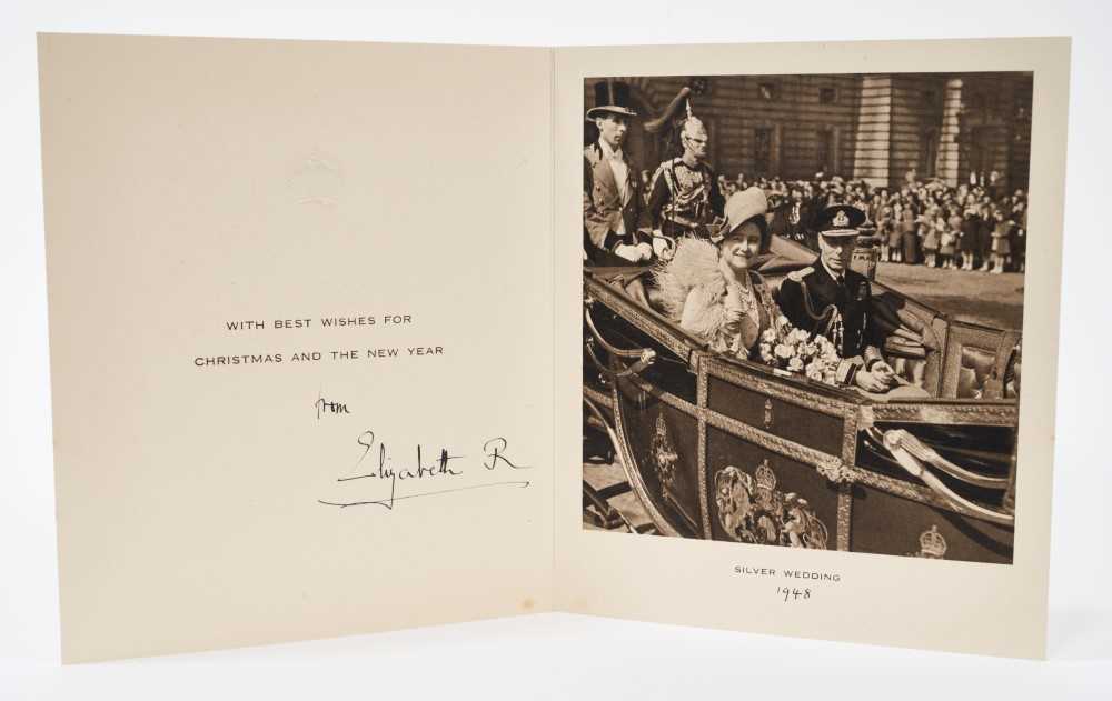 Lot 59 - H.M.Queen Elizabeth (later The Queen Mother) signed 1948 Christmas with gilt embossed crown to cover, photograph of the King and Queen in an open carriage on their Silver Wedding Day, signed ' El...