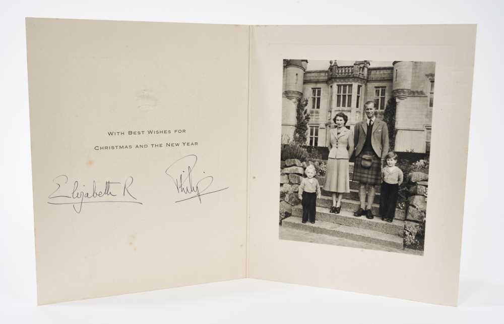 Lot 65 - H.M Queen Elizabeth II and H.R.H. The Duke of Edinburgh, signed 1952 Christmas card with gilt crown to cover, photograph of the Royal couple at Balmoral with the young Prince Charles and Princess A...