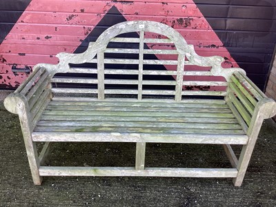 Lot 980 - Lutyens style teak garden bench