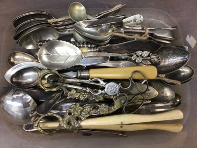 Lot 696 - Pair of Georgian silver scissor action sugar nips, German silver (800) spoon and assorted plated cutlery