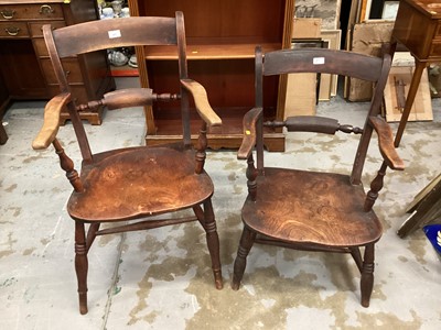 Lot 987 - Two 19th century knife back country elbow chairs