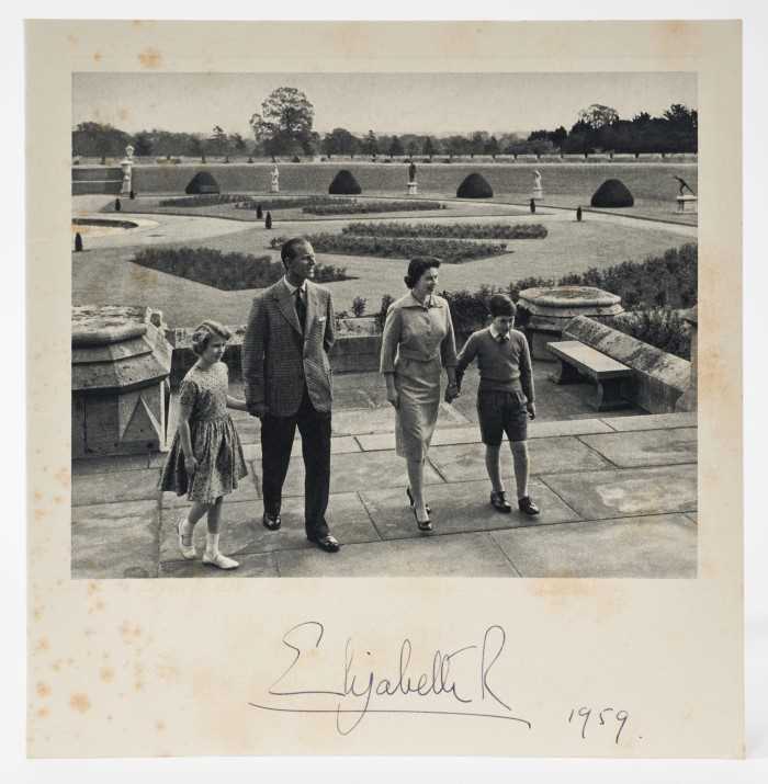 Lot 72 - H.M.Queen Elizabeth II  signed 1959 Christmas card with twin gilt ciphers to front, photograph of the Royal couple and children in a garden signed' Elizabeth R 1959'