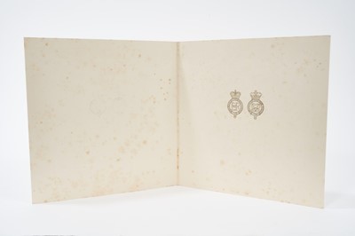Lot 73 - H.M.Queen Elizabeth II, signed 1960 Christmas card with twin gilt ciphers to cover, charming photograph of the Royal couple with their children and corgis seated on a rug in the garden of Balmoral,...