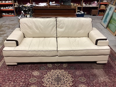 Lot 995 - Good quality ivory coloured leather settee and matching armchair