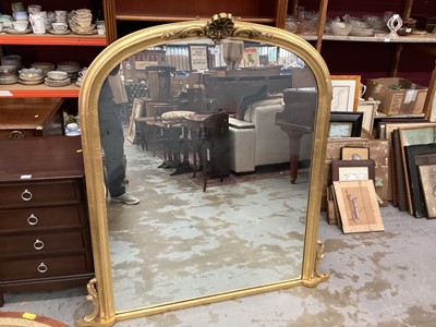 Lot 996 - Victorian style overmantel mirror in gilt frame with floral cresting, 138cm wide, 140cm high