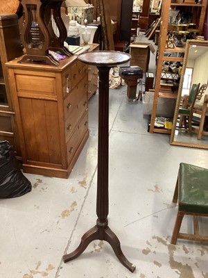 Lot 999 - Good quality mahogany torchere with circular top on reeded column on three splayed legs, 147cm high