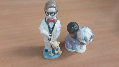 Lot 1153 - Two boxed Lladro figures