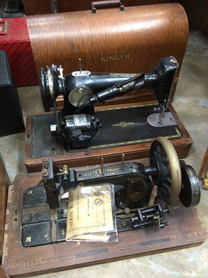 Lot 486 - Three vintage sewing machines to include two Singer and Frister & Rossmann, together with Underwood typewriter