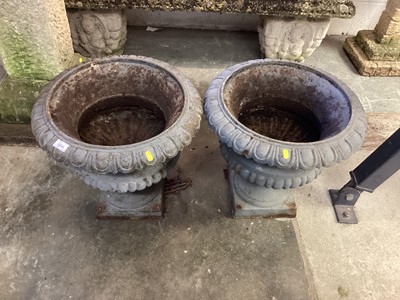 Lot 1004 - Pair of cast iron garden urns/planters, 48cm diameter, 46cm high