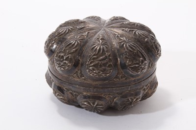 Lot 391 - Late 19th/early 20th century Indian white metal box of circular form, with detachable cover