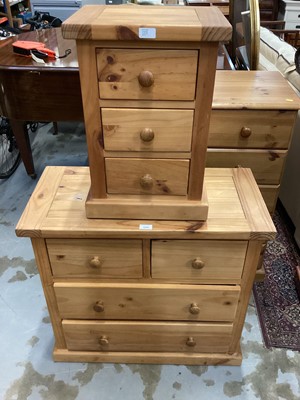 Lot 1008 - Pine chest of two short and two long drawers, 80cm wide, 38cm deep, 75cm high, together with a matching bedside chest, 39cm wide, 30cm deep, 57cm high (2)