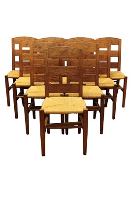 Lot 1311 - Set of ten rush seated brown oak country chairs by Dylan Pym