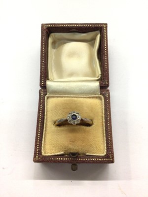 Lot 743 - 18ct gold sapphire and diamond flower head cluster ring