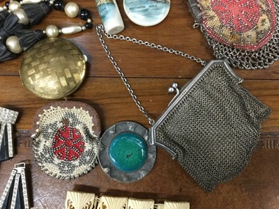 Lot 747 - Two silver topped Hunstanton Beach souvenir scent bottles with transfer printed scenes, together with a silver mesh purse, necklaces and other items.