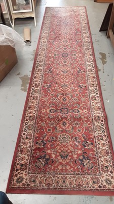 Lot 1022 - Eastern runner with floral decoration on pink and cream ground, 347.5cm x 83cm