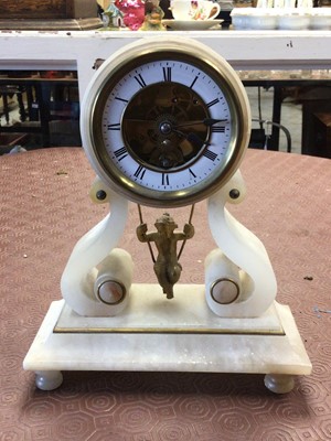 Lot 257 - French alabaster mantel clock with gilt cherub on a swing pendulum